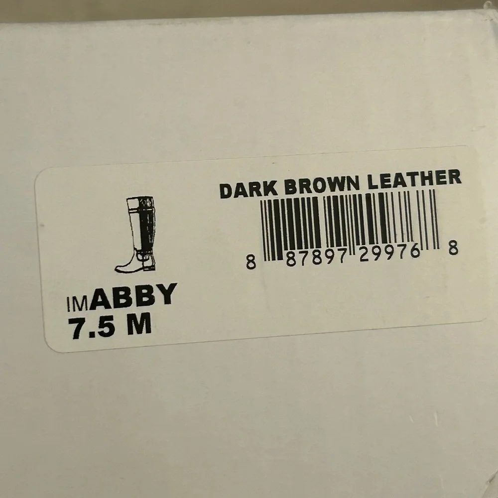 Isaac Mizrahi Live brown leather knee-high riding boots.
